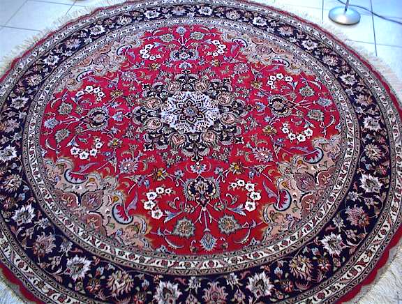 Tabriz Persian rug #1127, click on the picture or description for more details about the Persian carpets.