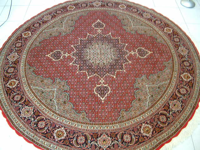 Tabriz Persian rug #1163, click on the picture or description for more details about the Persian carpets.