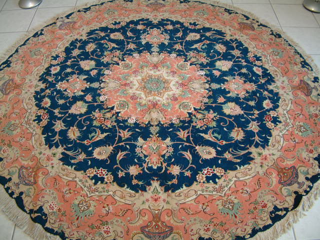 Tabriz Persian rug #1165, click on the picture or description for more details about the Persian carpets.