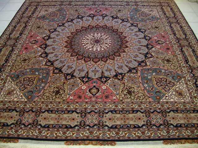 Very high 60 raj quality Square Tabriz Persian rug featuring a Gombad design. This 8 foot sized Tabriz is rare in quality and size and is a perfect example of what a high quality Tabriz rug should look with the traditional Gombardeh design.