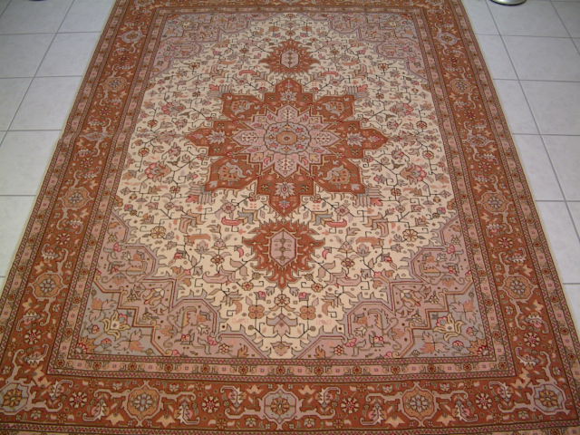 Tabriz Persian rug #1188, click on the picture or description for more details about the Persian carpets.