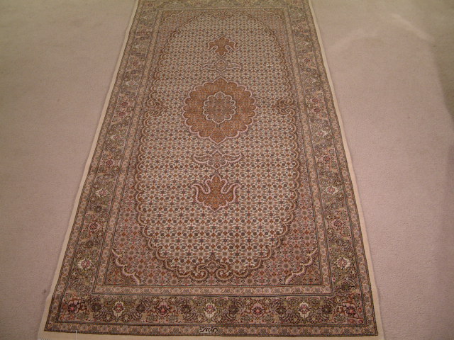 Tabriz Persian rug #1219, click on the picture or description for more details about the Persian carpets.