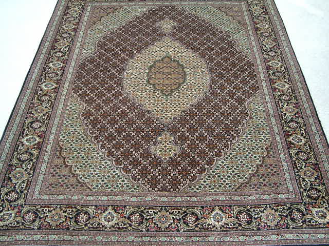 Tabriz Persian rug #1220, click on the picture or description for more details about the Persian carpets.