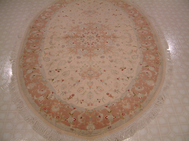 Tabriz Persian rug #1228, click on the picture or description for more details about the Persian carpets.