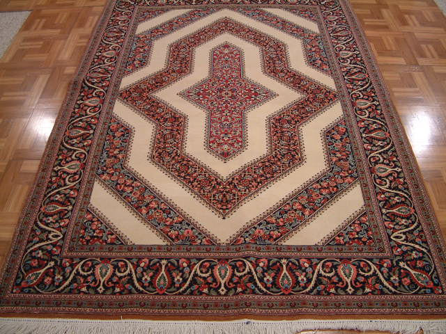 Qom Persian rug #1255, click on the picture or description for more details about the Persian carpets.