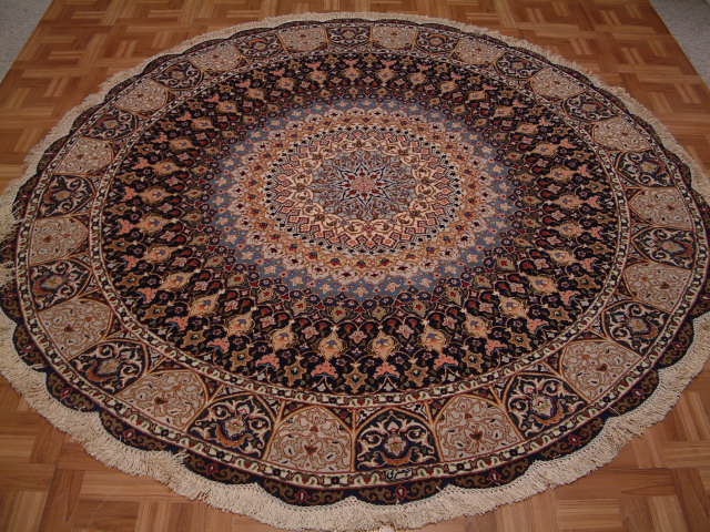 Round Tabriz Persian rug #1261, click on the picture or description for more details about this Persian rug and other Persian carpets in Atkinson New Hampshire.