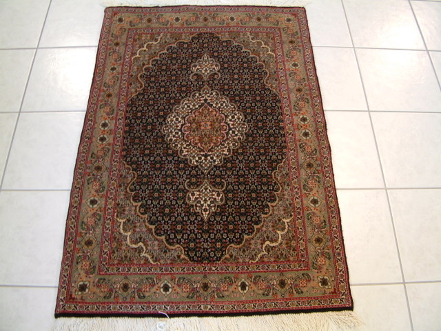 Tabriz Persian rug #3136, click on the picture or description for more details about the Persian carpets.