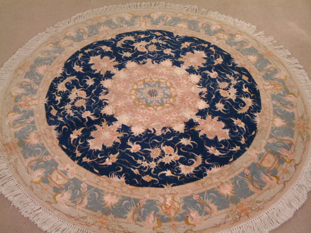 Tabriz Persian rug #3154, click on the picture or description for more details about the Persian carpets.