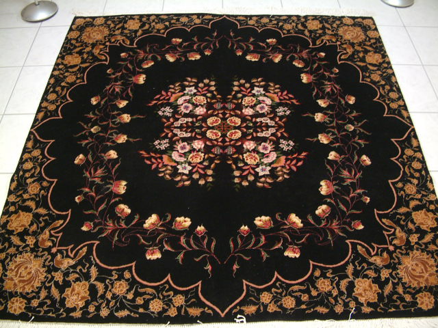 Square Oriental carpets sample #9. This large square Tabriz oriental carpet features a very high quality and also has an equally unique design. Square Oriental carpets like this Tabriz piece are centerpieces and are often the focal point of any room.