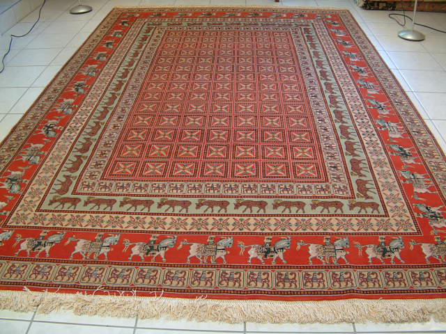 High quality Tabriz oriental carpets sample #10. Oversized Tabriz Oriental carpet with a tribal design, lots of silk highlights and a 60 raj silk foundation. Large oriental carpets like this high end Tabriz carpet are very rare and definite showpieces.