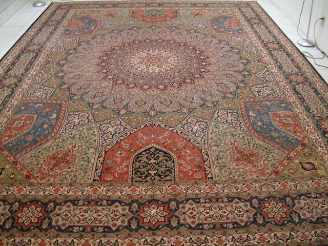 And finally, I wanted to showcase this oversized 10x13 Tabriz Gombad rug with the traditional design, but some unique color combinations. In particular, the olive green is very rare in Persian rugs and one of the nice features of the Gombad design is that the rugs tend be very colorful and the weavers often add colors that are not commonly seen.