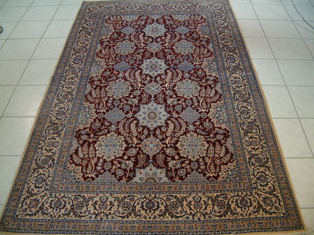 This Nain Persian carpet is the finest and highest quality of all of mine Nain rugs and it has a 4-Lah quality. The term LAH refers to the number of strands per fringe and the smaller the number, the finer the rug. All of my Persian Nain carpets are extremely fine pieces and this is the first Nain carpet with a genuine 4-Lah quality and over 600 knots per square inch making it as fine as many of the pure silk Persian carpets you see in stores.