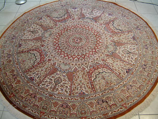 Persian carpets #9. Round pure silk Qom Persian carpets like this piece are extremely hard to find and very valuable. Among the highest quality Persian carpets are the Qum Persian carpets made of pure silk and many are placed in formal rooms or hang on walls.