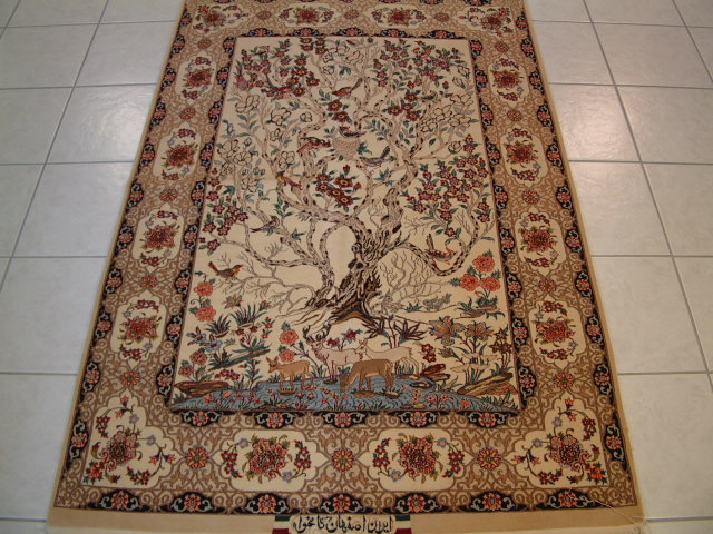 This picturial Persian Isfahan rug is a perfect example of what a high quality Isfahan oriental carpet should look and feel like. The design features the 4 seasons pattern and as with all of the high end Isfahan oriental carpets that I offer, this picture rug is made with a silk foundation. Many of my Persian carpets are sold to clients all over the world and whether you are a local or overseas, the service will be to the highest standards. my clients like to purchase the Persian picture rugs like the Tabriz rugs and Isfahan oriental carpets for walls, and some even have them framed.