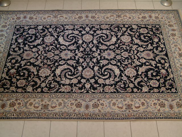 X-Large Nain Persian rug with a very unique design and no center medaillion. Nain rugs are made near and in the city of Isfahan and they come in various types of quality like most other Persian carpets. The Nain rugs that I feature are made of a very high quality and to have over 600 kpsi is not unusual. To begin with, all of my Nain oriental carpets are 6-lah quality and I always look for unique designs like this one.