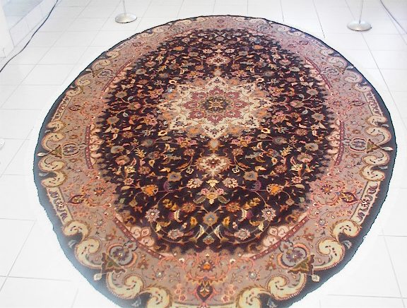 Another one of the most unusual Persian carpets that I have offered is this large oval Tabriz oriental rug. Since this business is more of a hobby, I can look for and offer rare Tabriz carpets like this oval Persian rug that are truly unique. Persian oval rugs are much more difficult to make than the round oriental rugs and large oval rugs like this Tabriz carpet are extremely rare and very sought-after.
