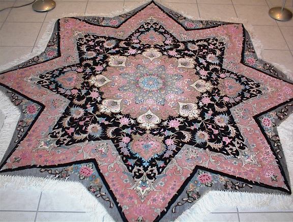 Another very rare Persian Tabriz rug is this star-shaped oriental carpet, which has received a trememdous amount of interest. Due to my family's Persian rug business in Tabriz, which has been there for generations, I am able to offer some of these rare Tabriz oriental carpets. My family has direct contacts with many of the weavers in the city and as a result I can purchase Persian rugs that most other oriental carpet retailers are unable to unwilling to offer because of the uniqueness or cost of the Persian rugs.