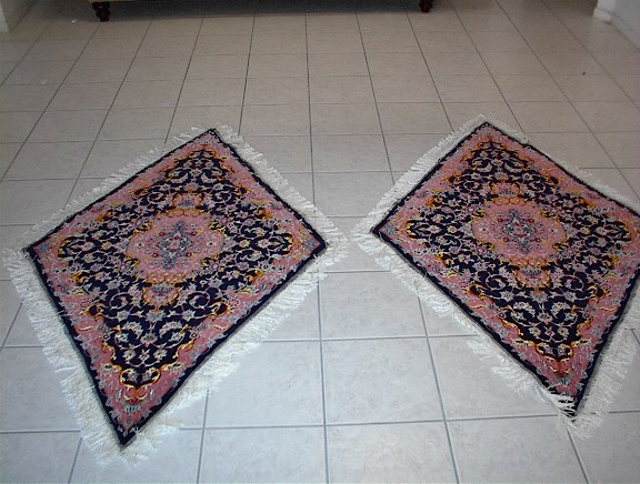 Medium sized twin Tabriz oriental rugs with a diamond shape, which is one of the most unique Persian carpets that I have ever offered. My specialty is in rare and truly unique Persian rugs like this set and many of my oriental carpets are so rare that they are actually purchased by other retailers who then turn around and sell them in their stores. Due to my direct family connections in Tabriz, I am able to receive some of the most remarkable Tabriz Persian rugs, which are well known for their at times rare designs. 