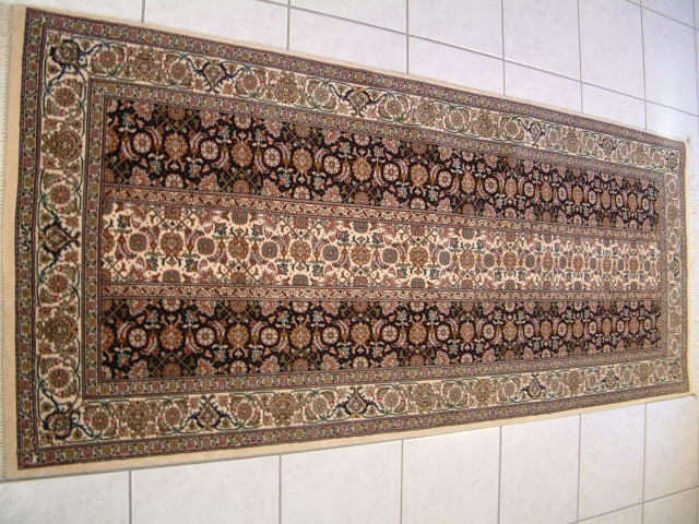 This Mahi rug runner was also made by the Pirouzian family and it is a slight variation of the new Mahi rug design.