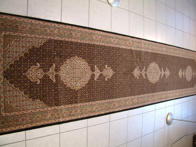 Long dark navy blue Tabriz Mahi rug runner designed for long hallways and also for steps.
