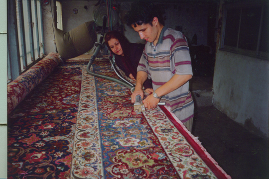 One of the final steps in the production of a Persian carpet and perhaps the most delicate is the carving of the silk highlights in fine Persian rugs. Most high end Tabriz carpets and other fine Persian rugs have large areas of pure silk and in order for the silk to be shiny and spectacular, it is slightly trimmed for added beauty. One wrong step and the person can tear a hole, cut the pile, or otherwise damage the Persian carpet severely.