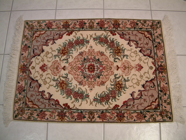 Tabriz Persian rug #2077, click on the picture or description for more details about the Persian carpets.