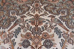 earth colored silk persian carpet